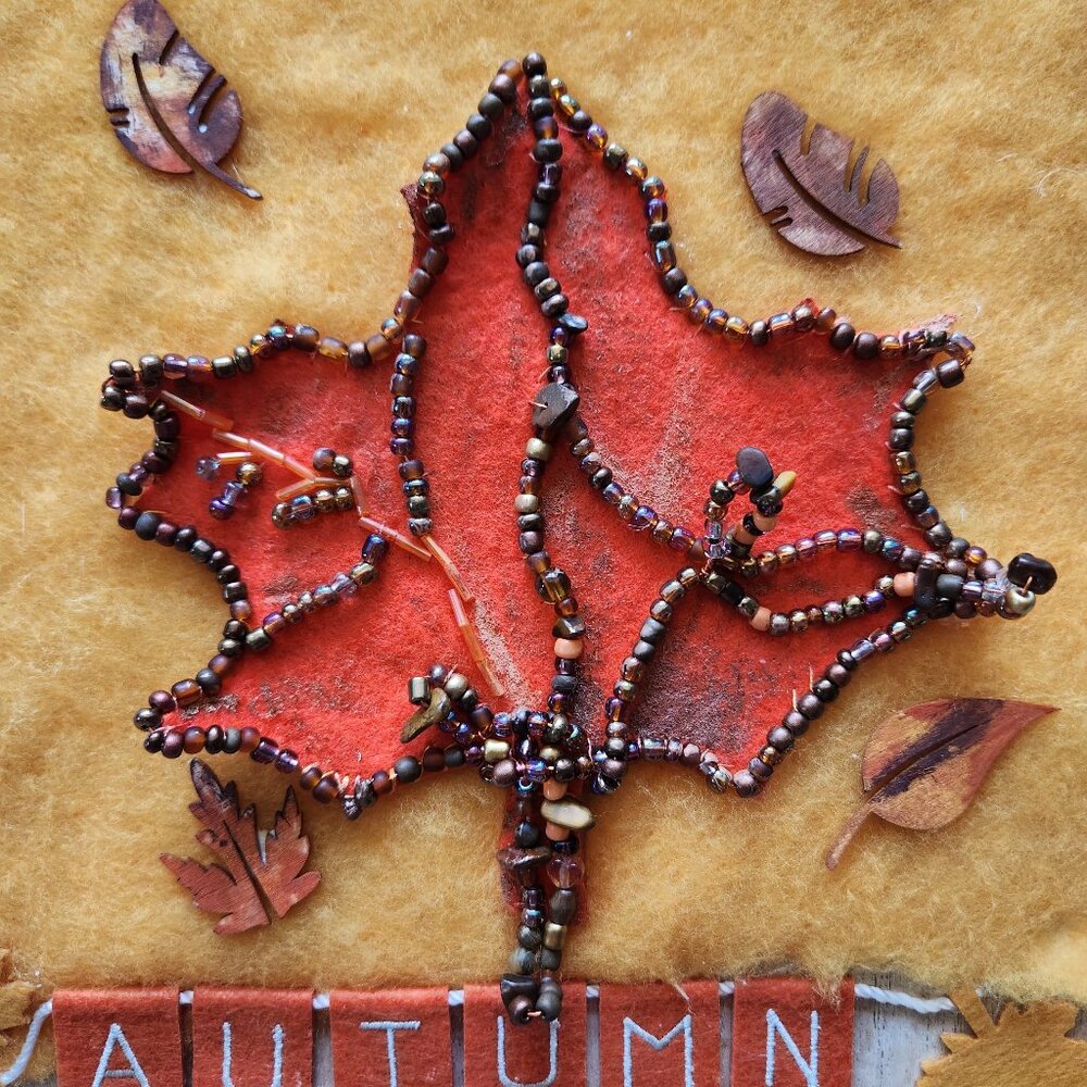 New handmade home decor felted and beaded leaf on a board ready to hang. 9x9inch